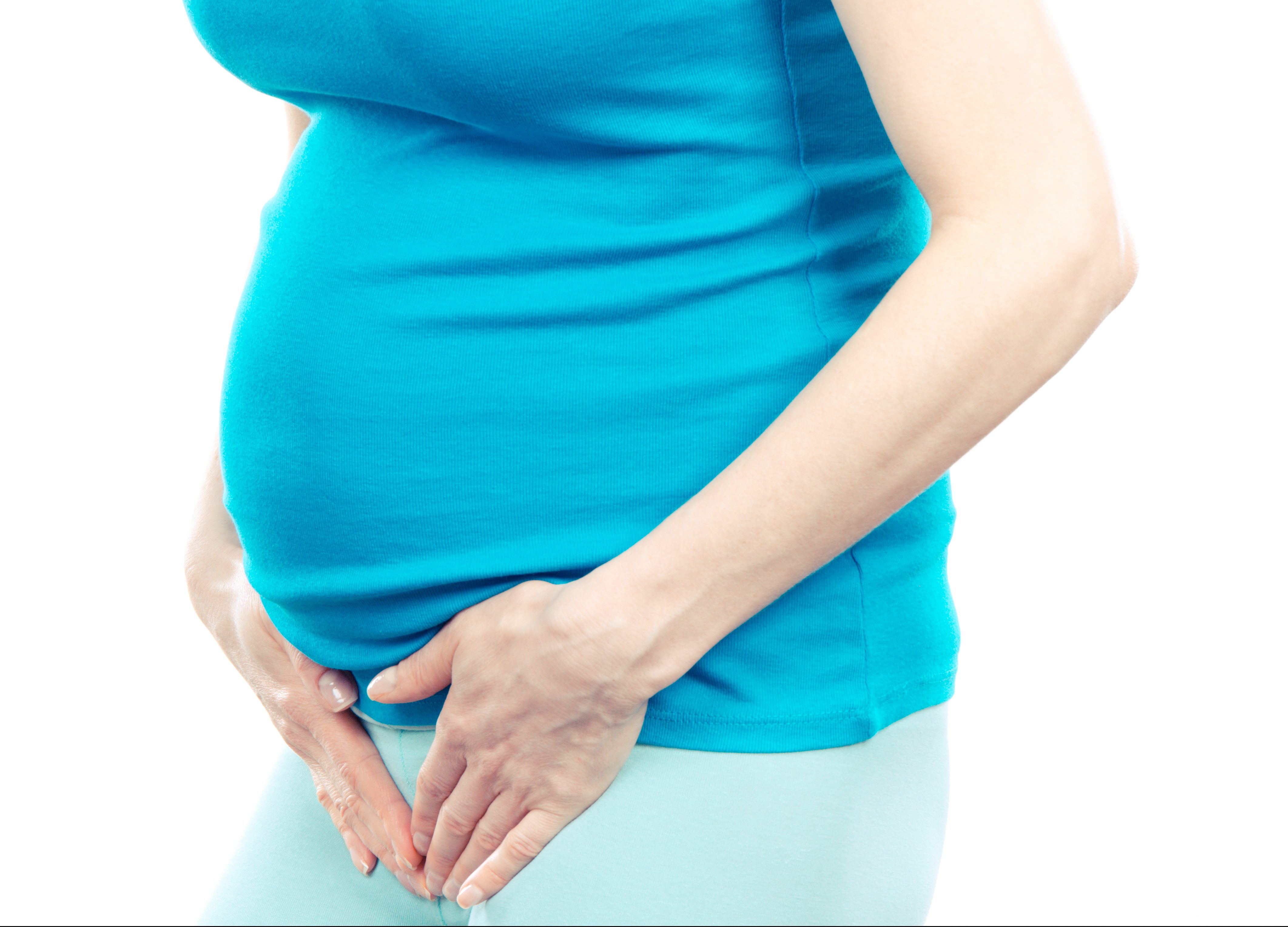 FUNIBER-pregnant-woman-with-hands-on-her-stomach-pregnancy-health-care-and-bladder-aches